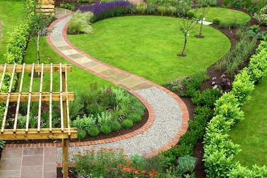 Brick edging on a curved garden path